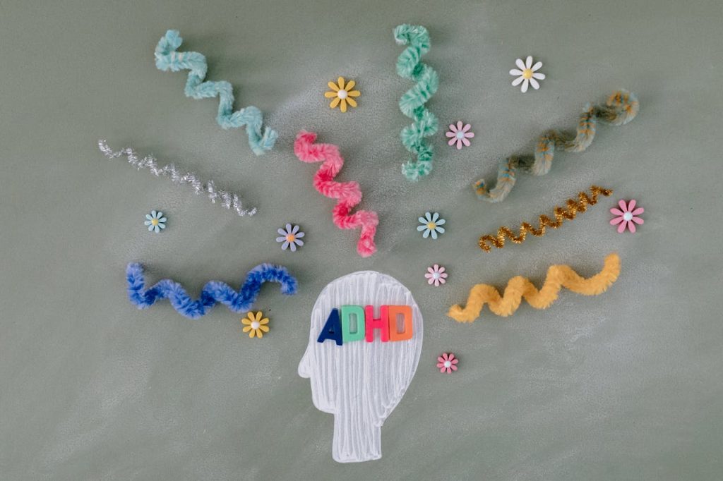 pexels photo 8378728 Creative illustration highlighting ADHD awareness with colorful brain imagery.