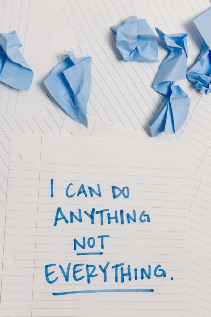 pexels photo 8406970 Inspirational message on paper amidst crumpled notes, conveying perseverance.